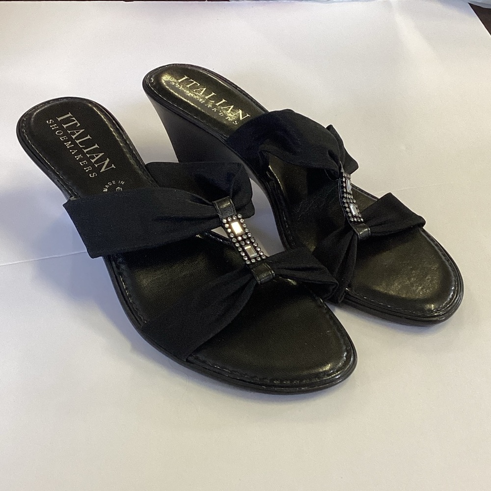 Italian shoemakers black sandals.